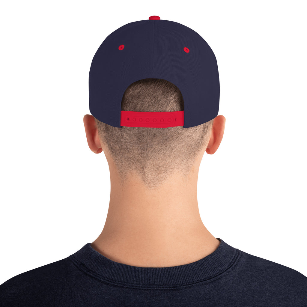 Finish First flat brim snapback in navy and red, back view